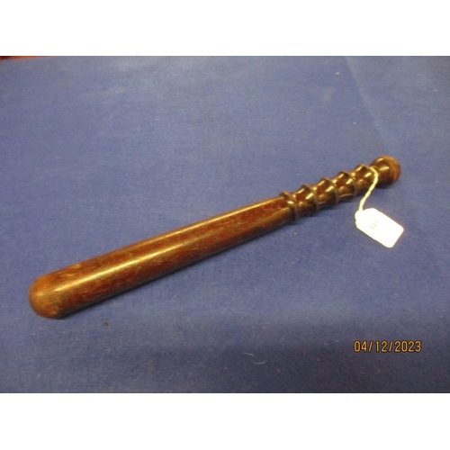 337 - A vintage rosewood truncheon