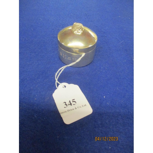 345 - A Channel Islands silver circular lidded pot with Ormer shell finial