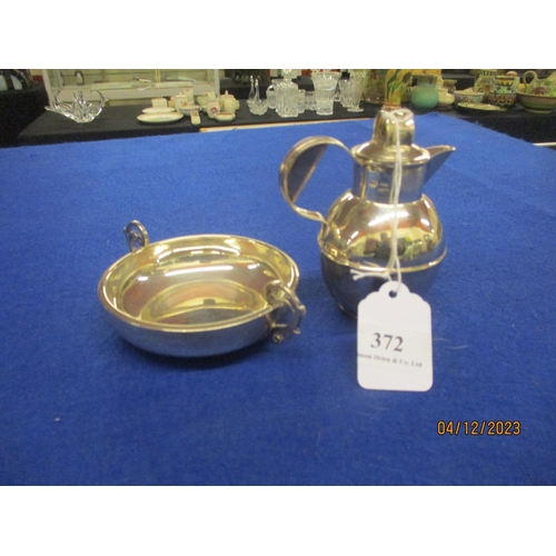 372 - A silver traditional Jersey milk jug and cover together with a silver twin handled christening dish