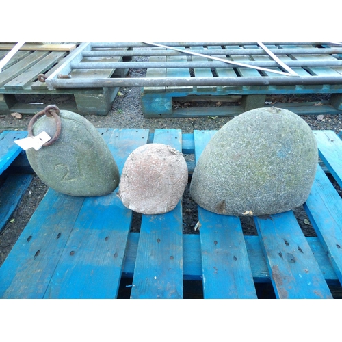 45 - Three Jersey granite corn weights