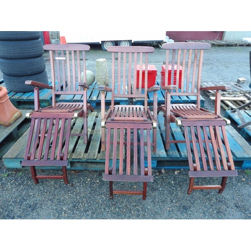 60 - A set of three teak steamer chairs