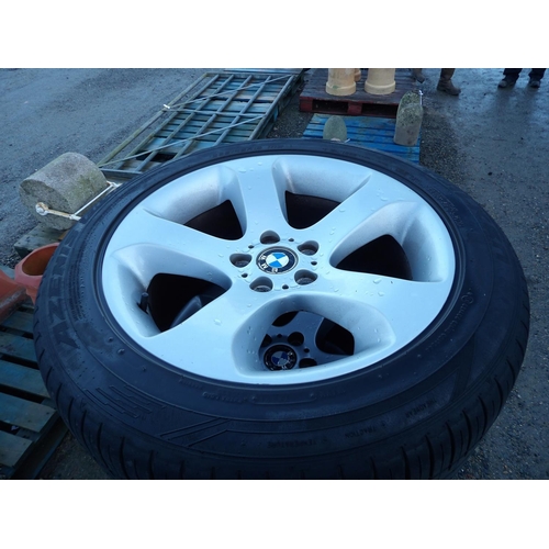 64 - A set of four BMW alloy wheels complete with tyres 285/45R19