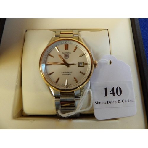 140 - A gentleman's Tagheuer Carrera Calibre 5 automatic wrist watch on stainless steel and gold bracelet ... 