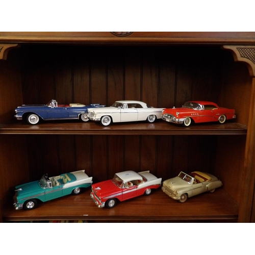 226 - A collection of six 1/18th scale diecast models of mid century American motor cars