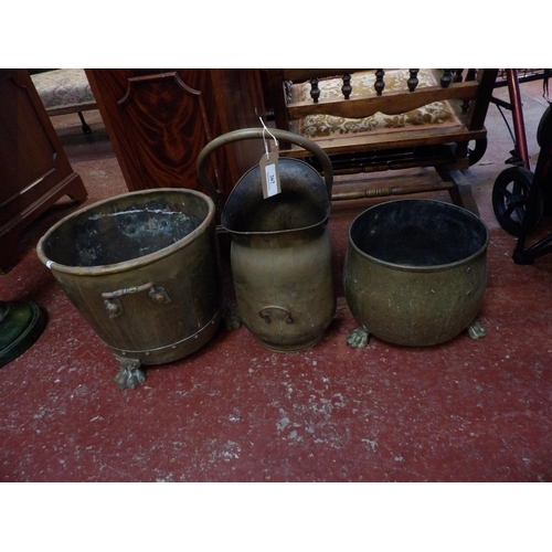 267 - Two brass cache pots together with a brass coal scuttle