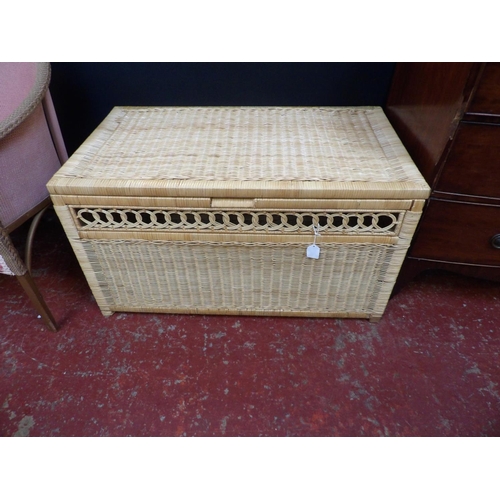 327 - A rattan storage chest