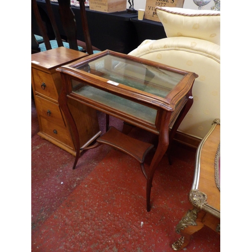 338 - An Edwardian walnut bijouterie table