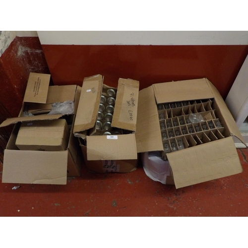 460 - A quantity of candle glasses, bottles and candle manufacturing materials