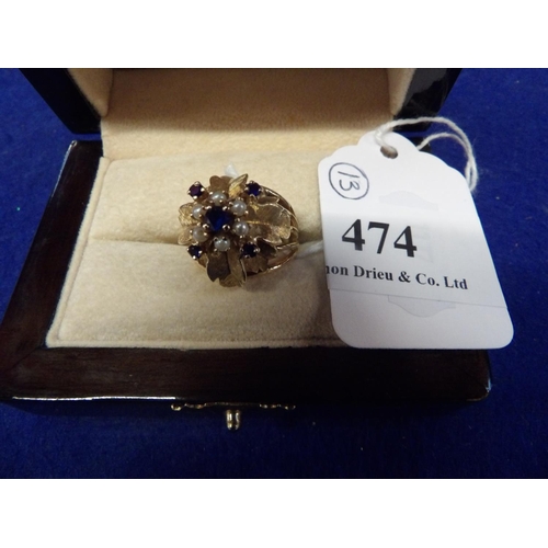 474 - A 14 carat gold sapphire and seed pearl ring