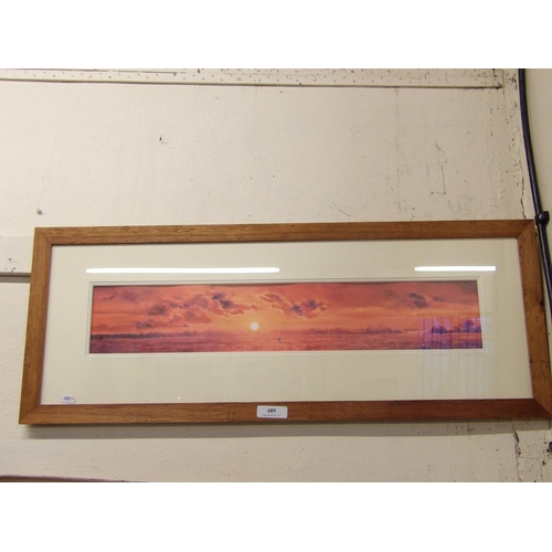 489 - A framed limited edition print depicting a sunset