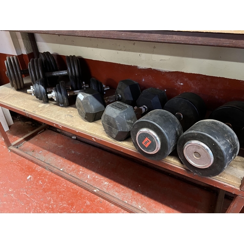 301 - Four pairs of assorted dumb bells together with a Fly-Bird bench