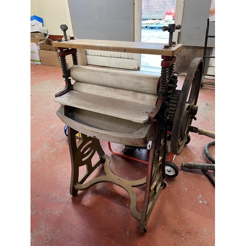 54 - A vintage clothes mangle by Messrs. Ubank Choice and bearing the retail stamp of Messer's. F. Le Gal... 