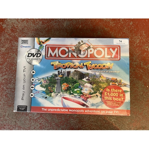 74 - A Monopoly Tropical Tycoon DVD television game - factory sealed