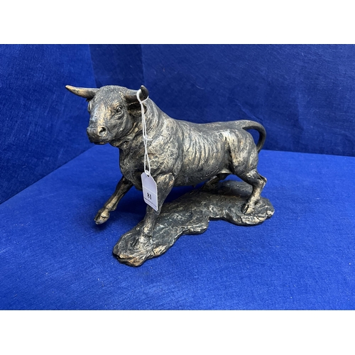 81 - A bronzed model of a bull