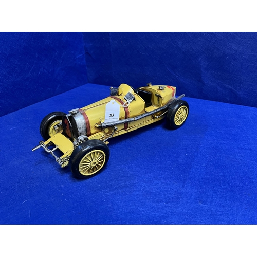 83 - A large tin plate model of a vintage racing car