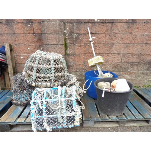 21 - Four inkwell lobster pots together with a parlour lobster pot, assorted ropes, buoys and markers