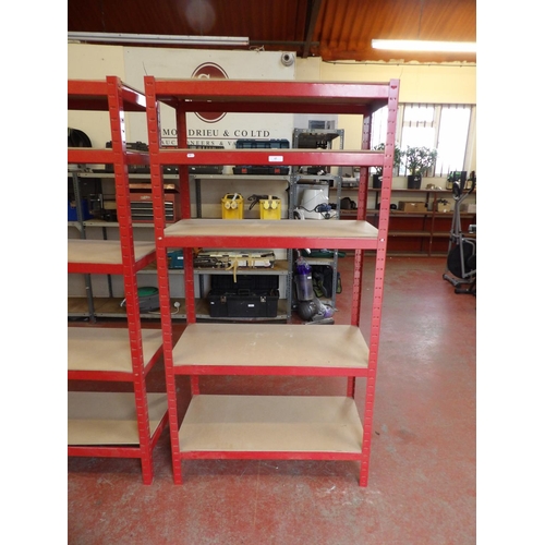 43 - A red metallic five tier shelf unit