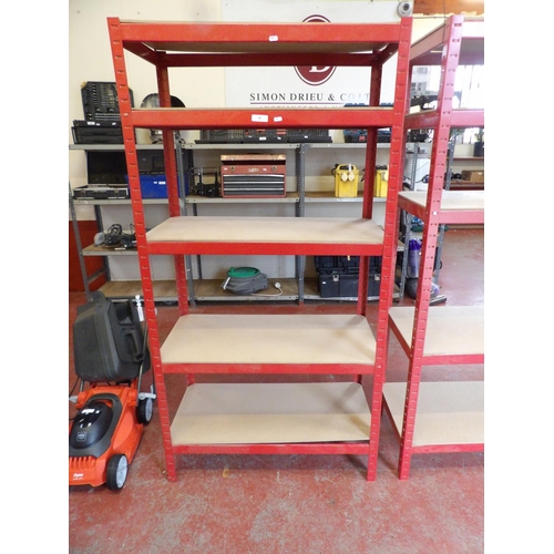 44 - A red metallic five tier shelf unit