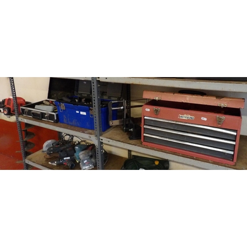 54 - Three tool boxes containing an assortment of tools and accessories together with a mitre saw