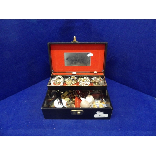 132 - A jewellery box containing an accumulation of costume jewellery