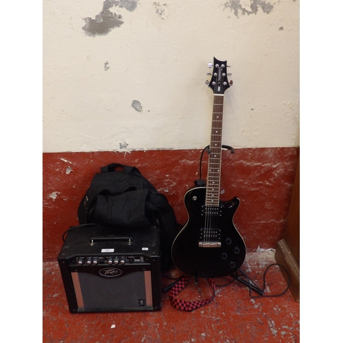 155 - A PRS Tremonti SE electric guitar, stand and case together with a Peavey Rage 258 amplifier