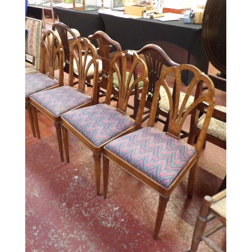 192 - A set of four Art Deco burr walnut dining chairs