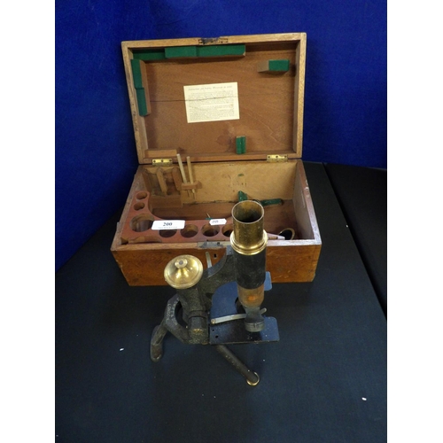 200 - A vintage laboratory microscope by Messrs. J. Swift & Son of London complete with fitted mahogany bo... 