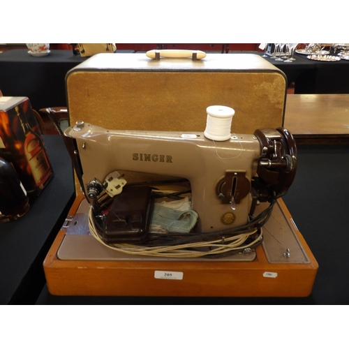 205 - A mid century Singer portable electric sewing machine