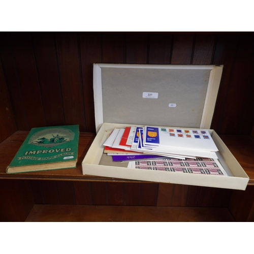 227 - A vintage stamp album together with a range of first day covers and mint sheet stamps