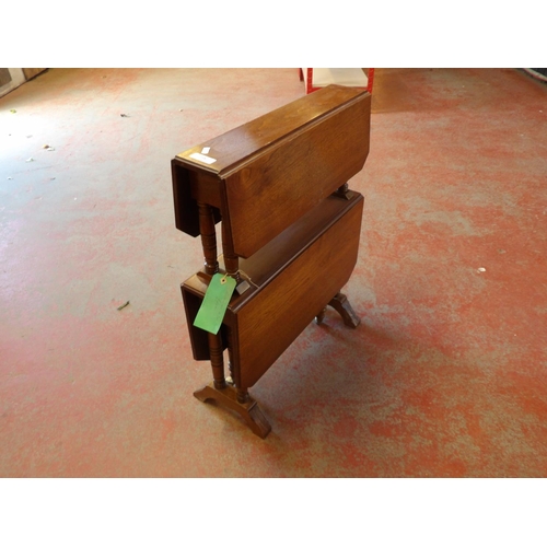 238 - A late Victorian walnut two tier Sutherland tea table