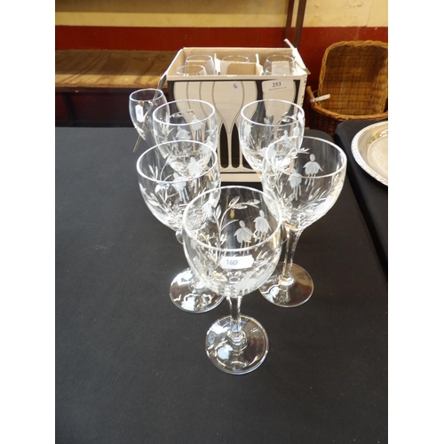 253 - A set of five Stuart crystal claret glasses together with a set of six Veuve Cliquot tulip glasses