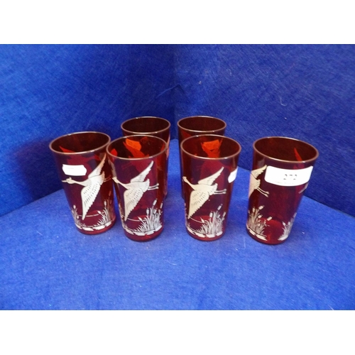 272 - A set of six early nineteenth century Bohemian glasses with etched bird decoration