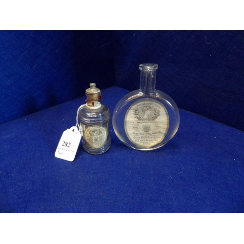 282 - Two rare antique Jersey P. Larbalastier royal warrant perfume bottles