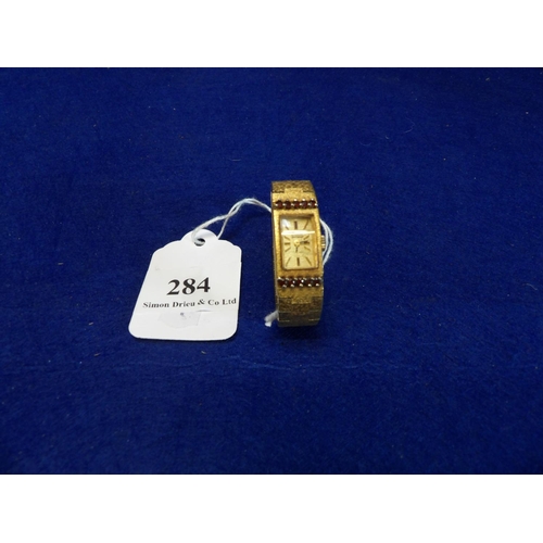 284 - A gilded bracelet wrist watch