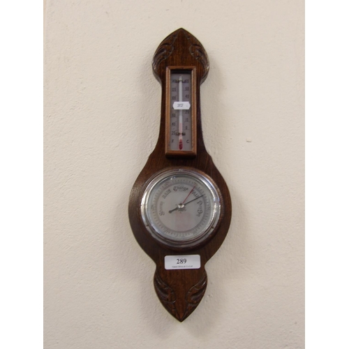 289 - An oak cased barometer and thermometer