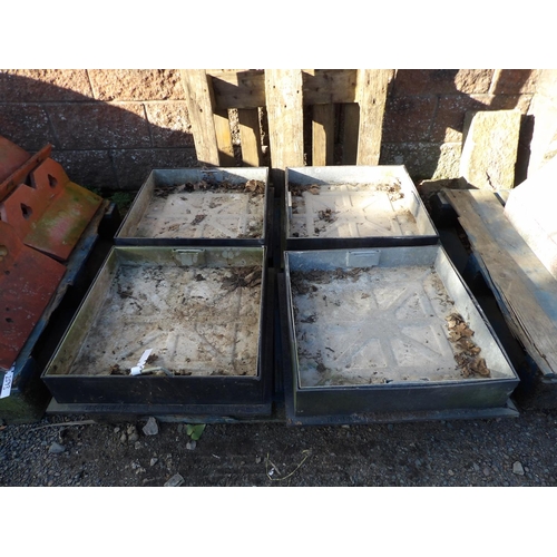 20 - Four heavy duty galvanised manhole covers complete with composite frames