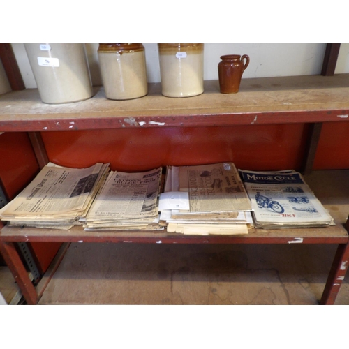 78 - An accumulation of vintage newspapers and other ephemera