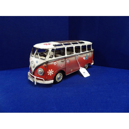 86 - A tin plate model of a Volkswagen split screen camper van