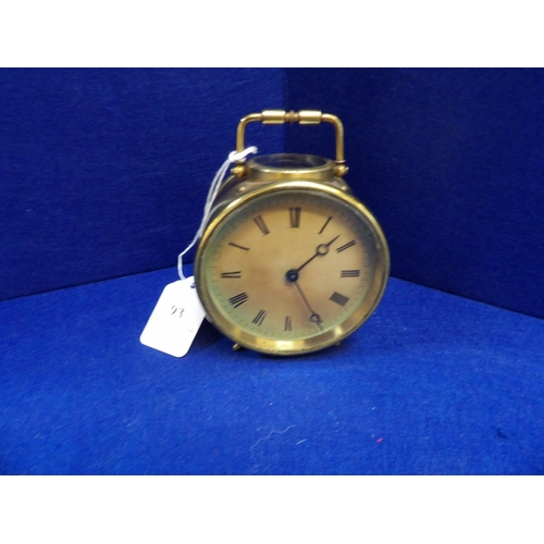 93 - A brass cased table clock