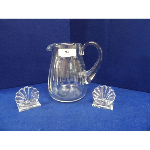 94 - A Baccarat glass water jug together with a pair of Baccarat glass name place holders