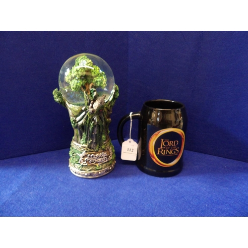 112 - A Lord of the Rings Nemesis Now model together with a Lord of the Rings ceramic tankard