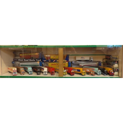 114 - A collection of die cast tractor unit and trailer models