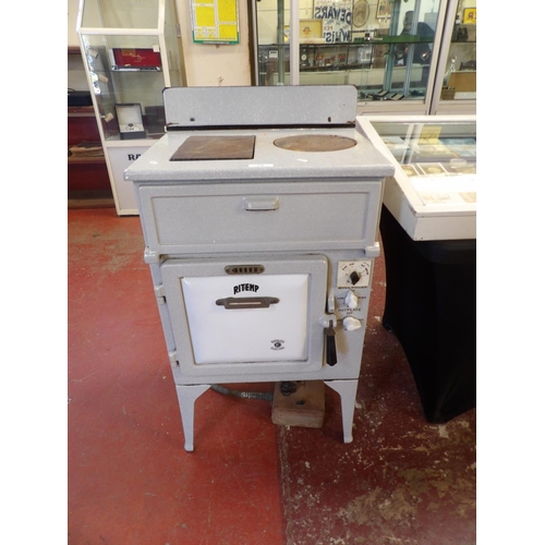 176 - An early twentieth century Ritemp enamelled cooking range by The English Electric Company