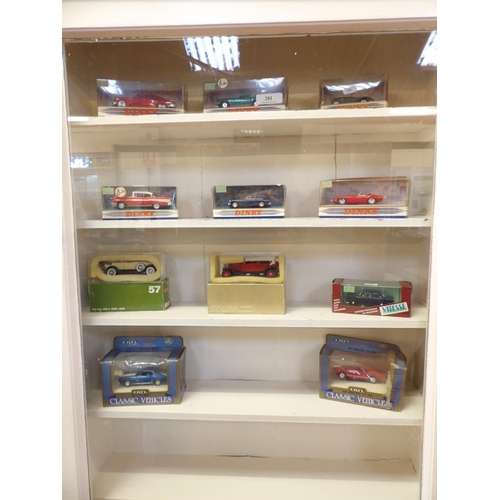 281 - A collection of boxed diecast model vehicles