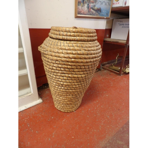 294 - A vintage wicker snake charmer laundry basket