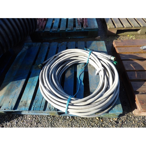 43 - Two coils of hosepipe complete with fittings