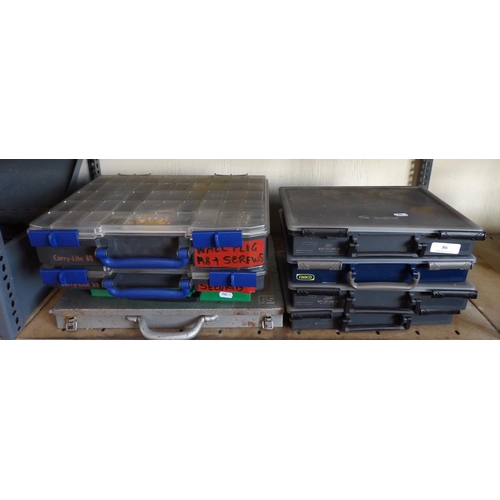 86 - Eight compartment boxes containing various fixings, fastenings and consumables