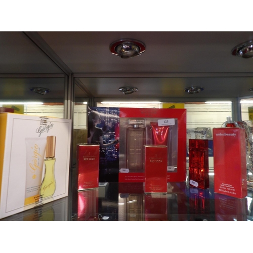 123 - Assorted perfume and perfume sets by Elizabeth Arden and Giorgio of Beverley Hills