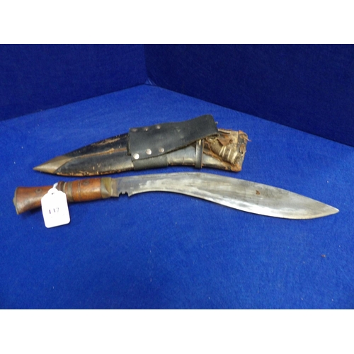 137 - A vintage kukuri and scabbard