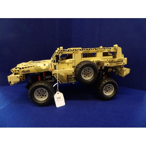 145 - A plastic Technic style model of an army vehicle